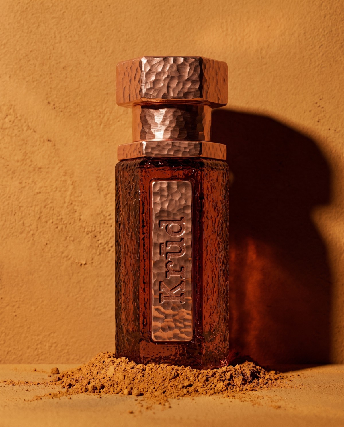 Ocre — oxide orange hammered glass bottle with bronze hex cap
